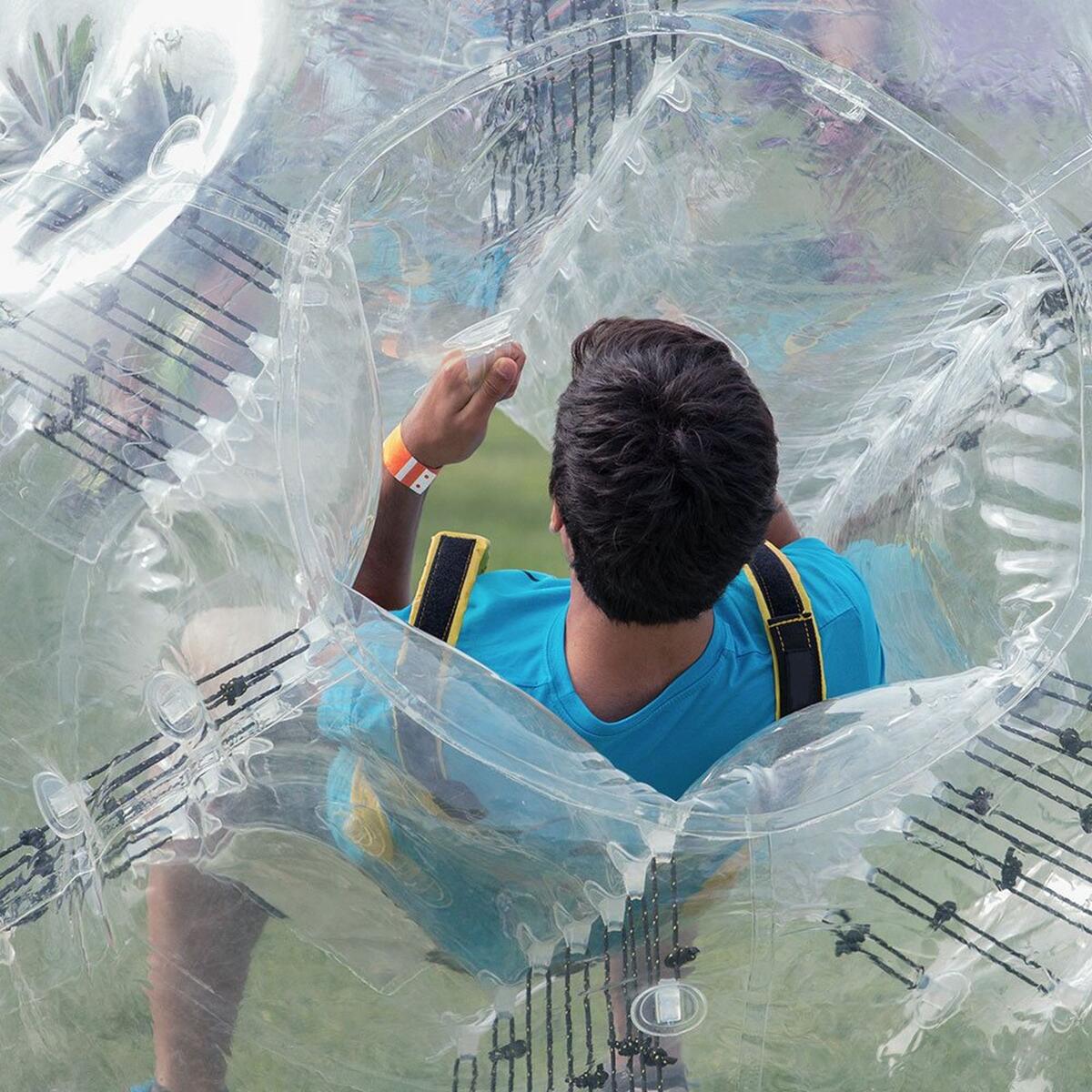 Kids playing bubble football at GOALS